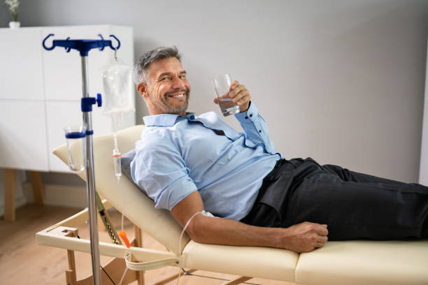 A man rehydrates with mobile IV therapy after a long night out.