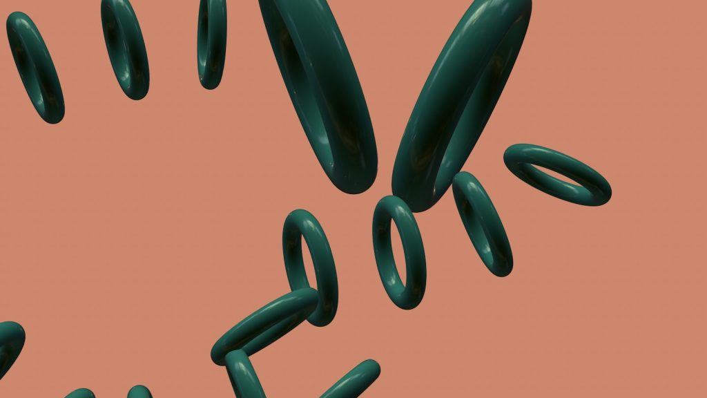 a group of green objects floating in the air